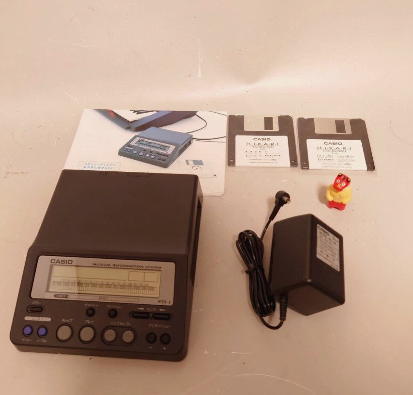 Casio FD1 floppy disk midi player in original with Accessories