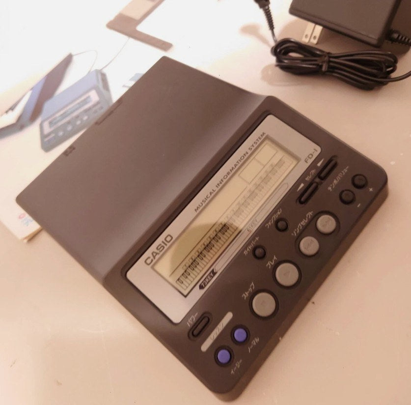 Casio FD1 floppy disk midi player in original with Accessories